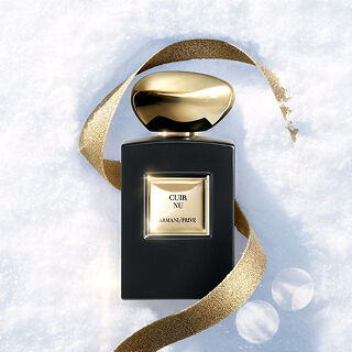 Armani/Prive The Yulong fragrance on snow with a golden ribbon for a refined winter scent.