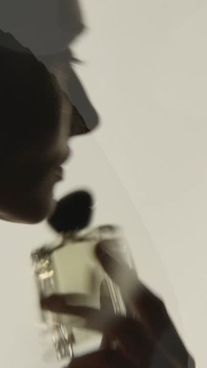 Armani Prive luxury fragrance collections: Les Eaux in clear glass, Les Terres Precieuses in vibrant green and red, and Les Mille et Une Nuits in elegant black bottles with gold caps, reflecting exquisite craftsmanship and storytelling.            Armani/Prive Scent Finder key visual featuring a close-up of a dark, velvety flower with subtle gold highlights on a soft beige background, overlaid with the white ‘ARMANI/PRIVE’             Close-up of a model's silhouette in warm, golden lighting, showcasing elegant curves and shadows for Armani Prive.              Detailed macro shots of delicate flowers, featuring soft white petals, a vibrant purple and green allium, a white crocus with an orange stamen, and elegant deep magenta lilies, reflecting Armani Prive's natural elegance.           An artistic shadow of an Armani Prive fragrance bottle is cast against a light,                  Armani Prive showcases its luxury fragrance collections: the clear glass Les Eaux, the gemstone-inspired Les Terres Precieuses, and the opulent black Les Mille et Une Nuits, highlighting diverse scents and elegant, artistic bottle designs.