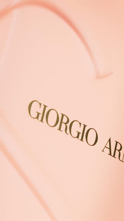 Split-screen video featuring Giorgio Armani Si Nude Bloom and Si Passione Red Bloom