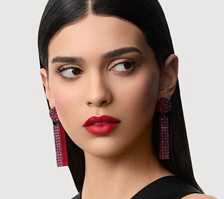 A woman displaying Armani beauty Signature Looks
