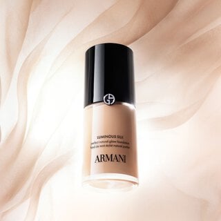 A close-up swirl of Luminous Silk Foundation shade, showcasing its silky texture and natural glow, indicative of its truer-to-skin formula.