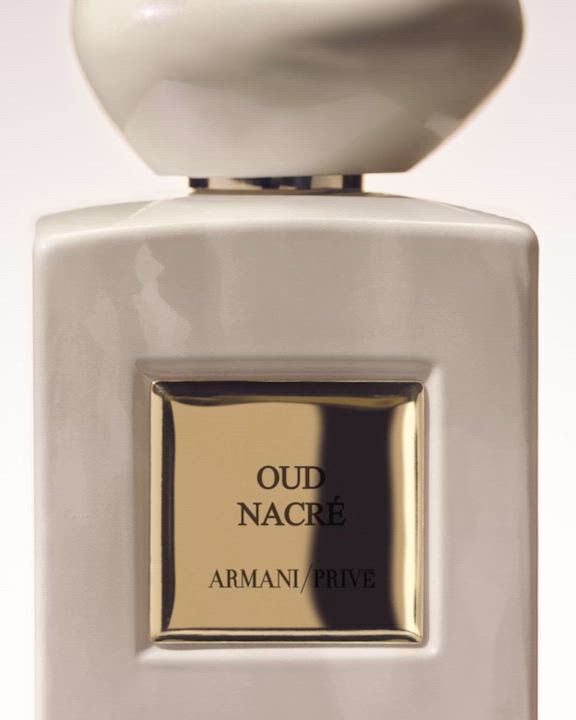 Video displaying different ingredients, fragrance bottles and cinematic silhouettes of Armani/Prive woody fragrances.