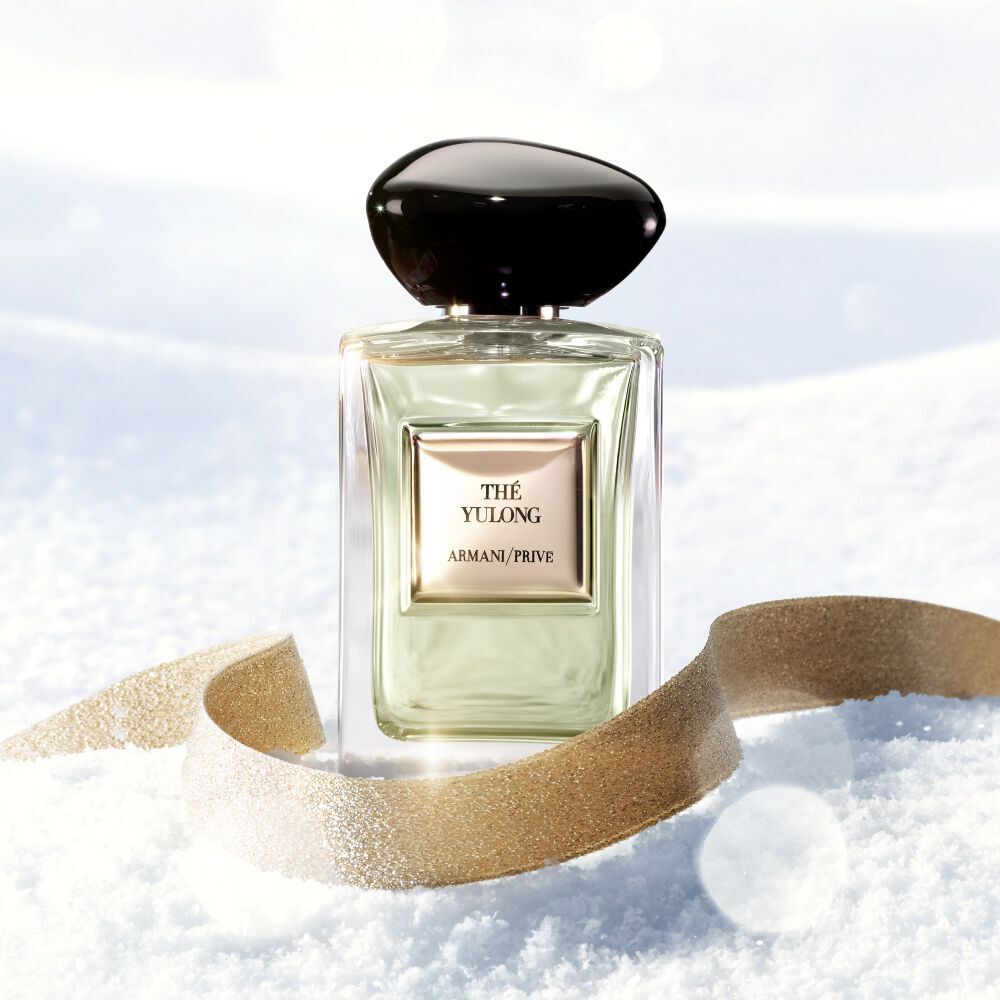 Armani/Prive The Yulong fragrance on snow with a golden ribbon for a refined winter scent.