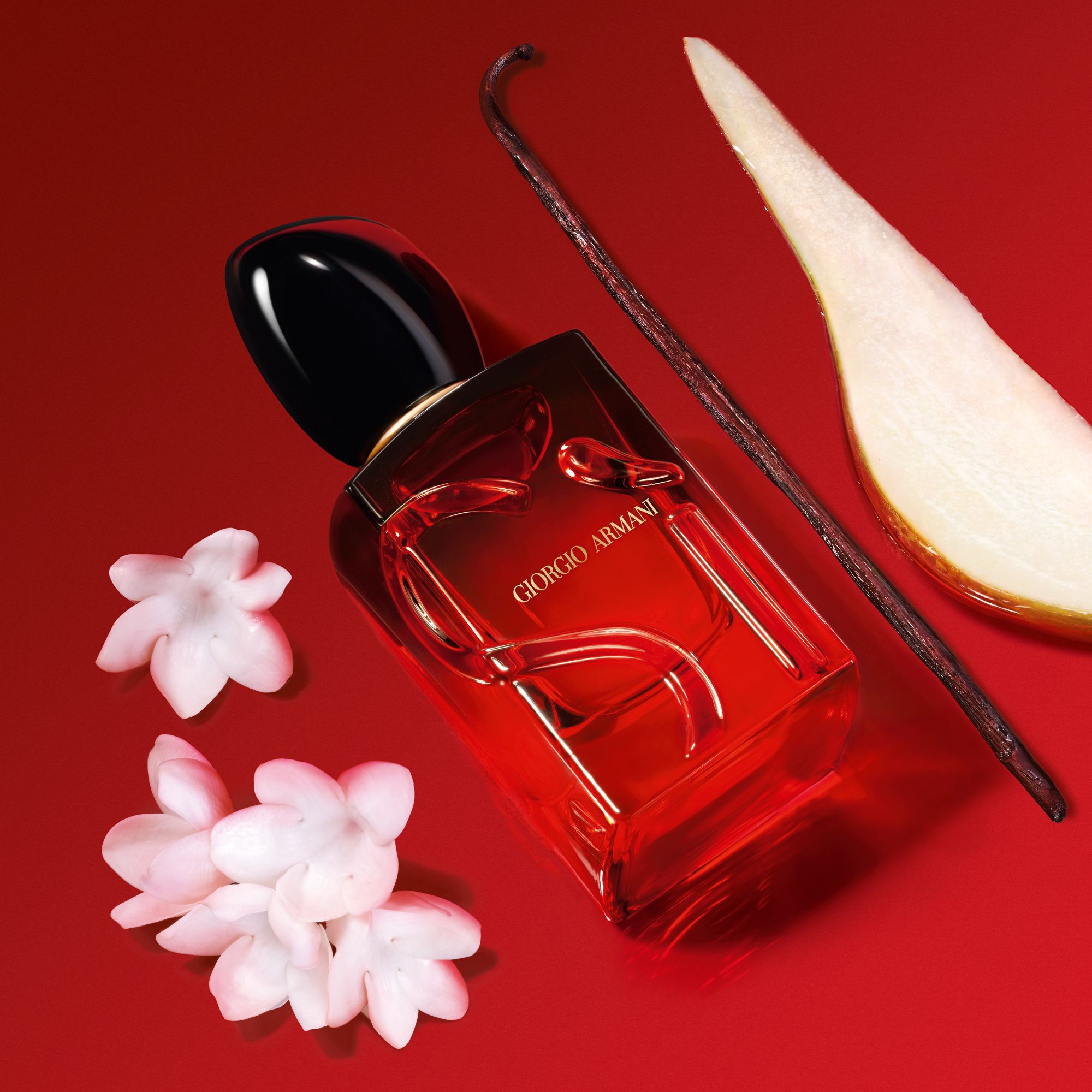 Giorgio Armani Si Passione Eau de Parfum Intense bottle with vanilla, pear and white flowers.