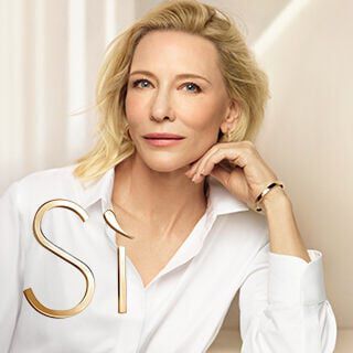 Portrait of Cate Blanchett with Giorgio Armani Si gold logo