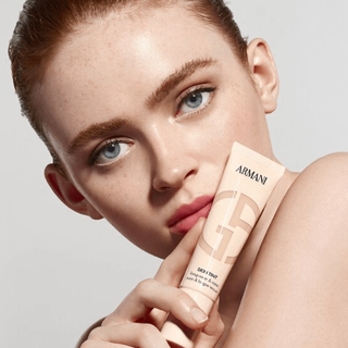 A woman displaying Armani beauty Signature Looks