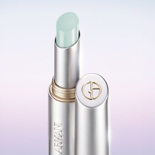 Prisma Flash Lip Balm by Giorgio Armani Beauty in a couture-inspired silver case with refined champagne gold accents.
