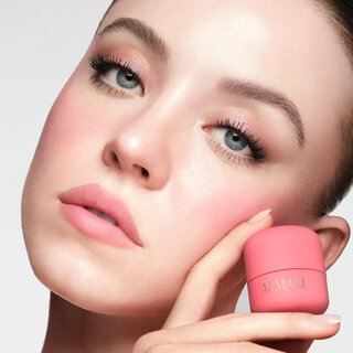 SYDNEY holding the pink Armani Beauty Dolci Blush with a natural soft-matte finish.
