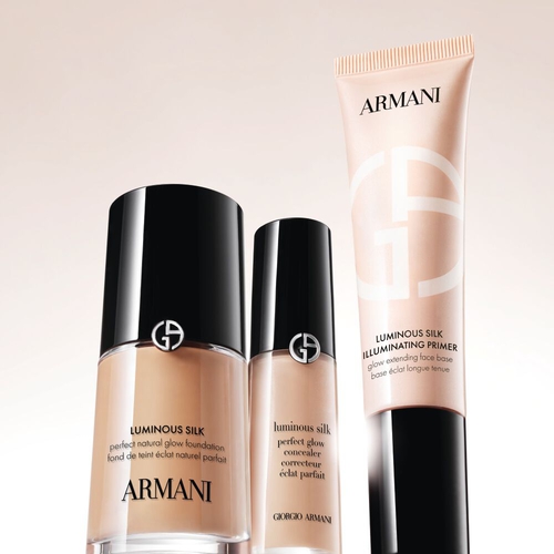 Armani Beauty Luminous Silk foundation, concealer, and Illuminating Primer displayed together