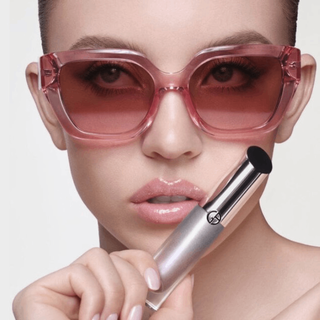 A woman displaying Armani beauty Signature Looks