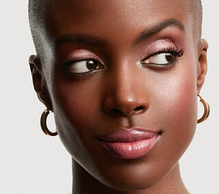 A woman with a look called “Prismatic Shine”, the art of capturing light.