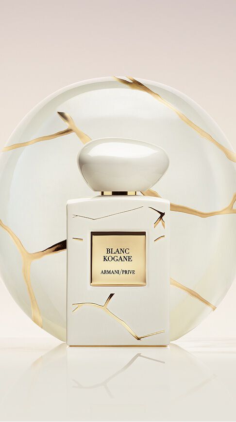 Bottle of Armani/Prive Blanc Kogane against a light beige and white background.
