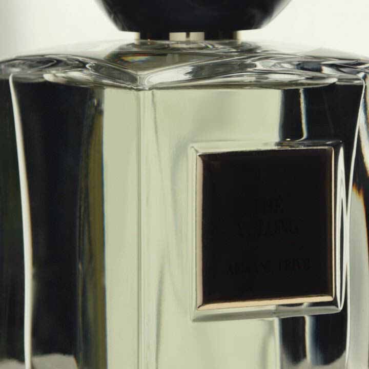 Giorgio Armani Prive The Yulong fragrance bottle featuring a leaf-inspired shadow and design element, highlighting luxury perfume craftsmanship.