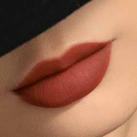 Close-up of lips wearing ARMANI LIP MAESTRO shade 102 Sandtone Nude.