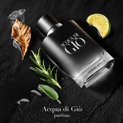 Acqua di Gio Parfum by Giorgio Armani, black bottle surrounded by bergamot, rosemary, incense smoke, and patchouli leaf on a dark abstract background — men's woody aromatic parfum.