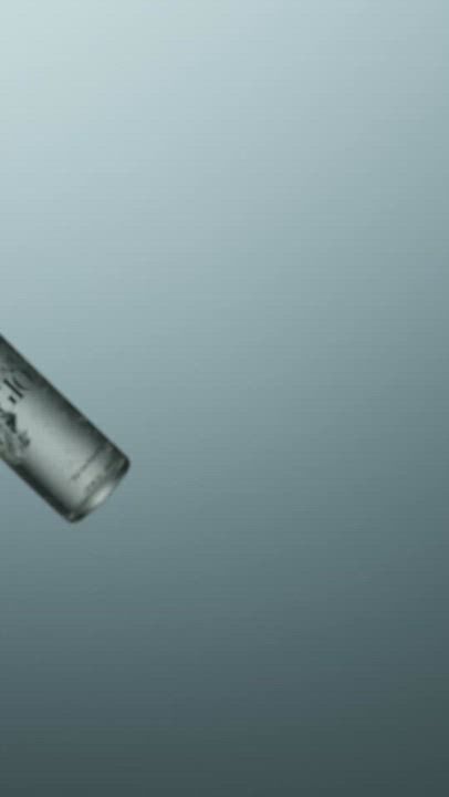 A cinematic image featuring an Armani Acqua di Gio cologne bottle. Floating against a neutral gradient, it transitions from a standalone focus to being held by an elevated hand, with two bottles converging at the spray nozzle, evoking a sense of refined luxury.