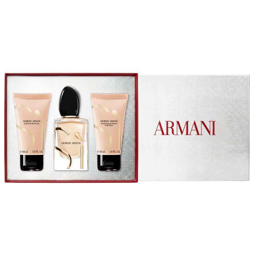 Si Eau de Parfum 50ml, 50ml perfumed body lotion and 50ml perfumed shower gel alongside an open white Armani gift box with red ribbon — women's floral fragrance gift set, white background.