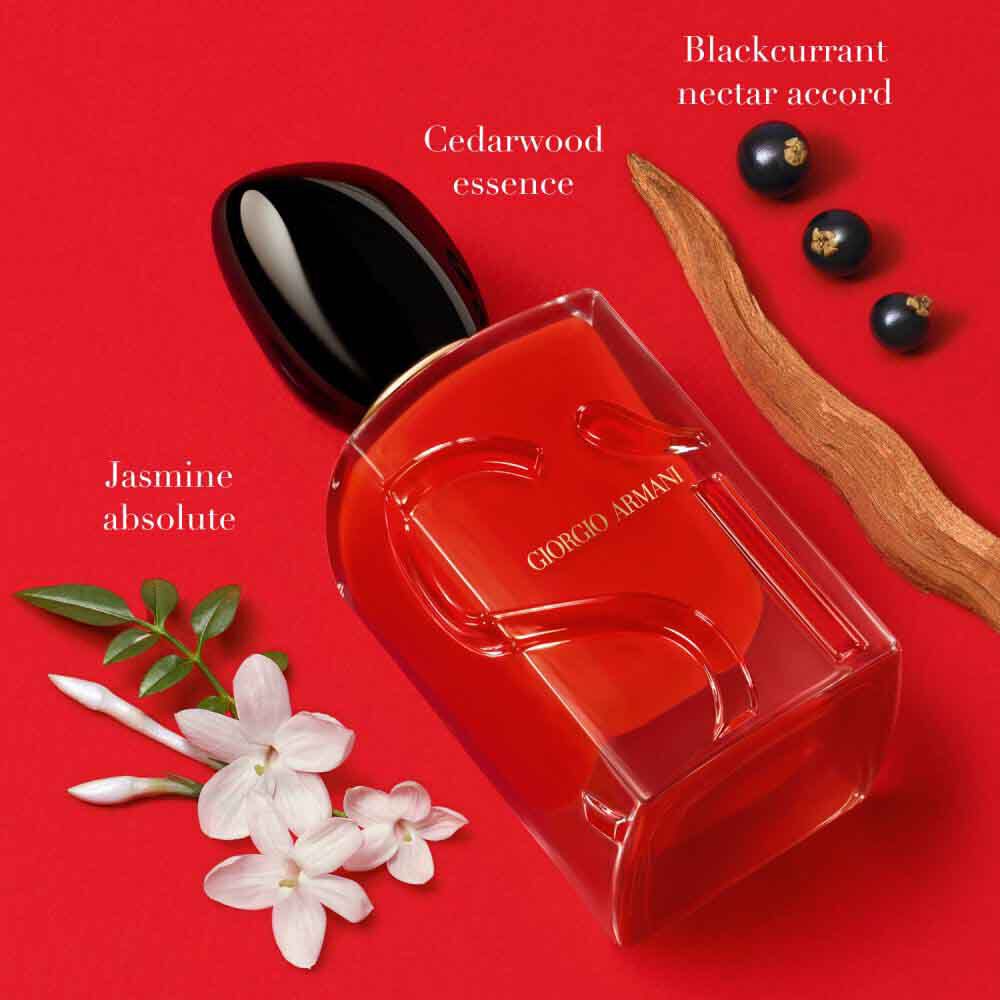 Si Passione Eau de Parfum by Giorgio Armani, ruby red bottle surrounded by jasmine absolute, cedarwood essence and blackcurrant nectar accord on a bold
