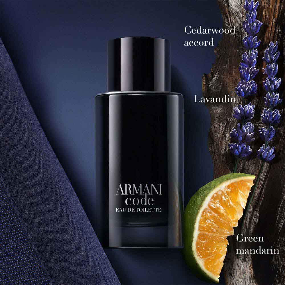 Armani Code Eau de Toilette by Giorgio Armani, black bottle with green mandarin, lavandin flowers and cedarwood accord on a deep navy background — men's aromatic woody fragrance.