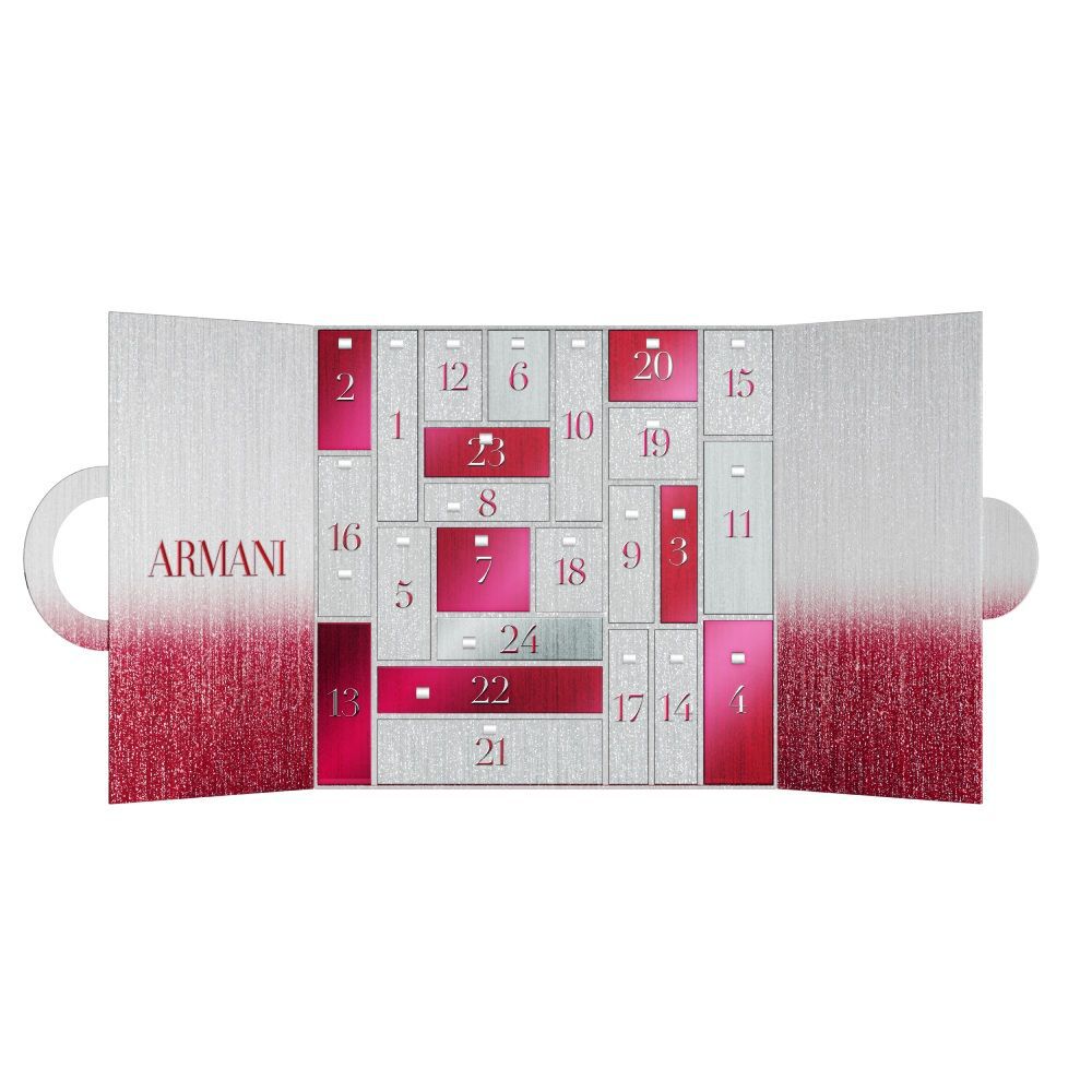 An opened Giorgio Armani advent calendar revealing numbered compartments in white and fuchsia, ready for daily surprises.  8 full size products,15 miniatures and 1 gift.	