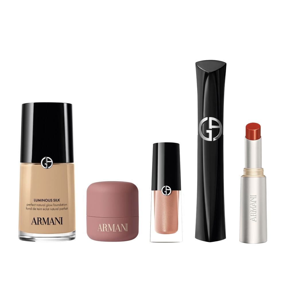 The Holiday Glow look products: Luminous Silk Foundation, Dolci Makeup Blush, Vertigo Mascara, Prisma Flash and Eyetint in a white background
