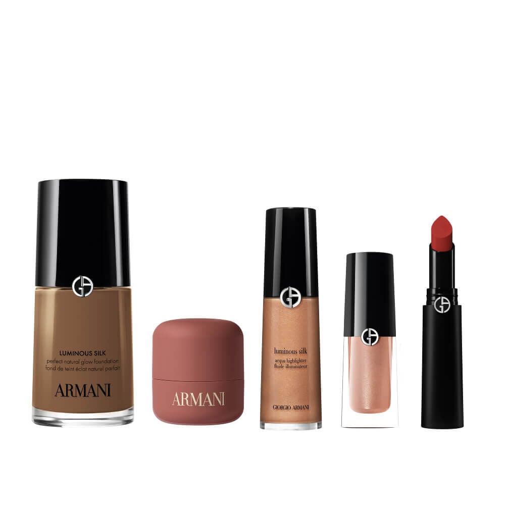 The Holiday Glow look products: Luminous Silk Foundation, Dolci Makeup Blush, Vertigo Mascara, Prisma Flash and Eyetint in a white background