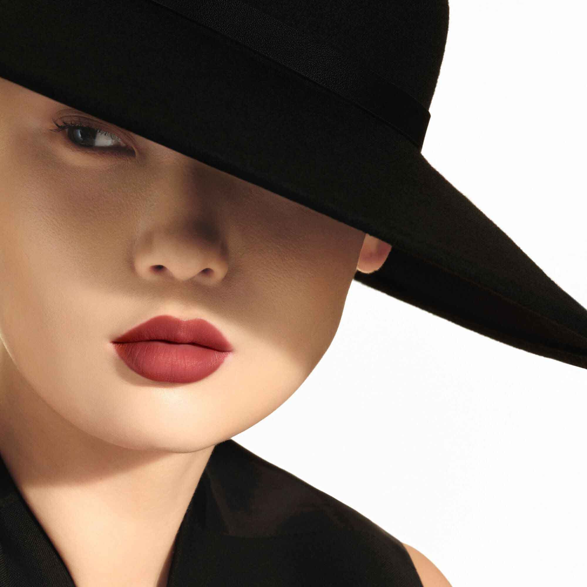 Close-up of Vitt-oria wearing ARMANI LIP MAESTRO in shade 520 Dusty Rose.