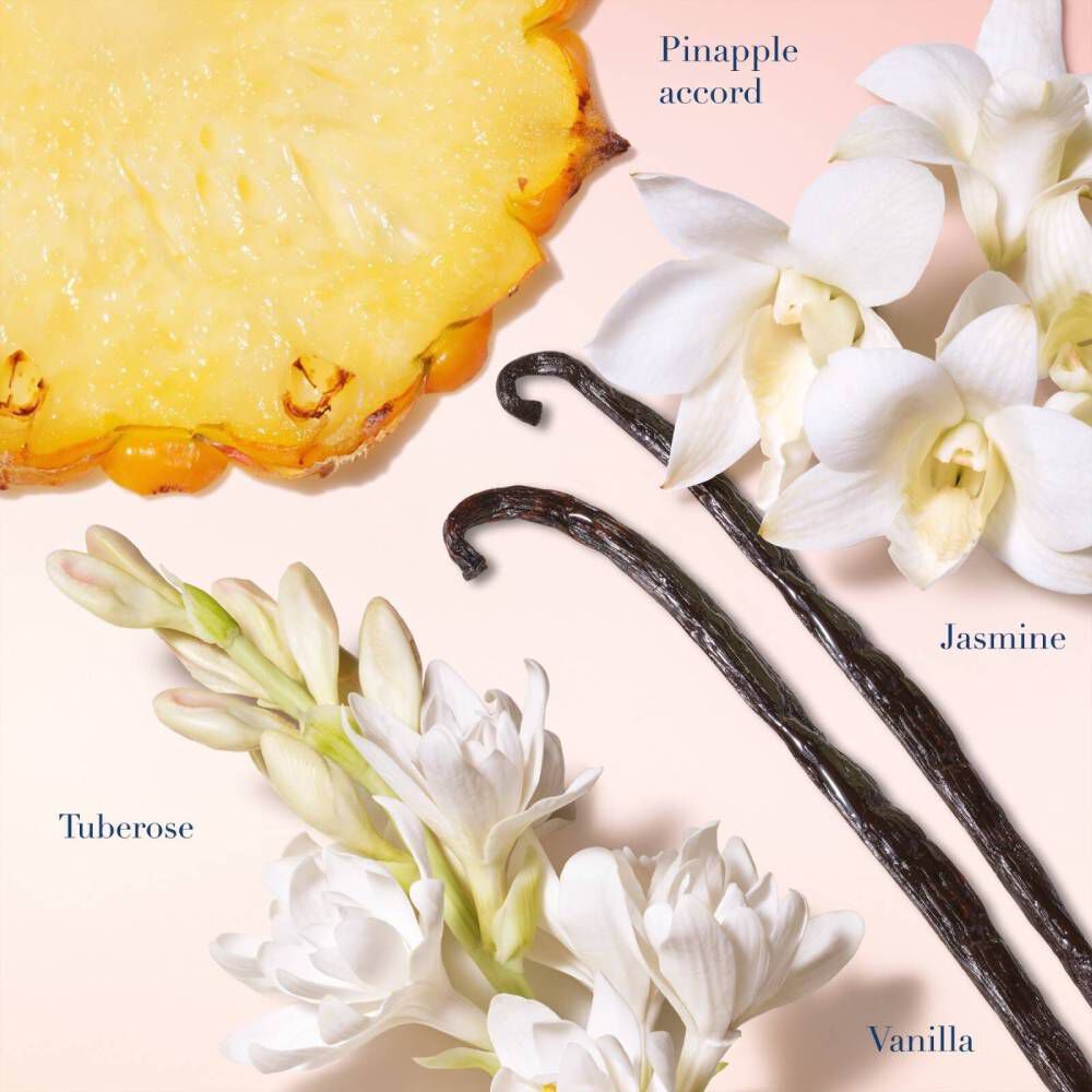 Close-up of fresh pineapple, white flowers, and vanilla beans, highlighting the natural ingredients of Armani’s My Way fragrance on a soft background.