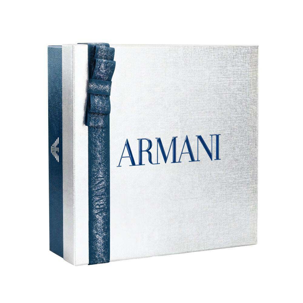 Emporio Armani Stronger With You  white and silver Armani gift box tied with blue satin ribbon, white background.