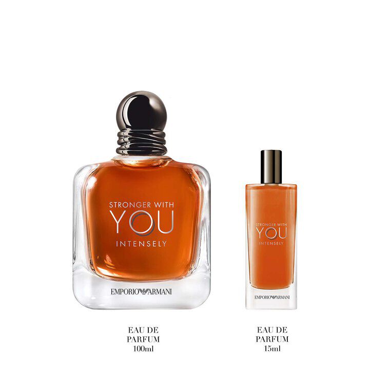 Armani STRONGER WITH YOU ABSOLUTELY EAU DE PARFUM and TRAVEL SPRAY displayed on a white background, focusing on the iconic bottle and portable fragrance option.