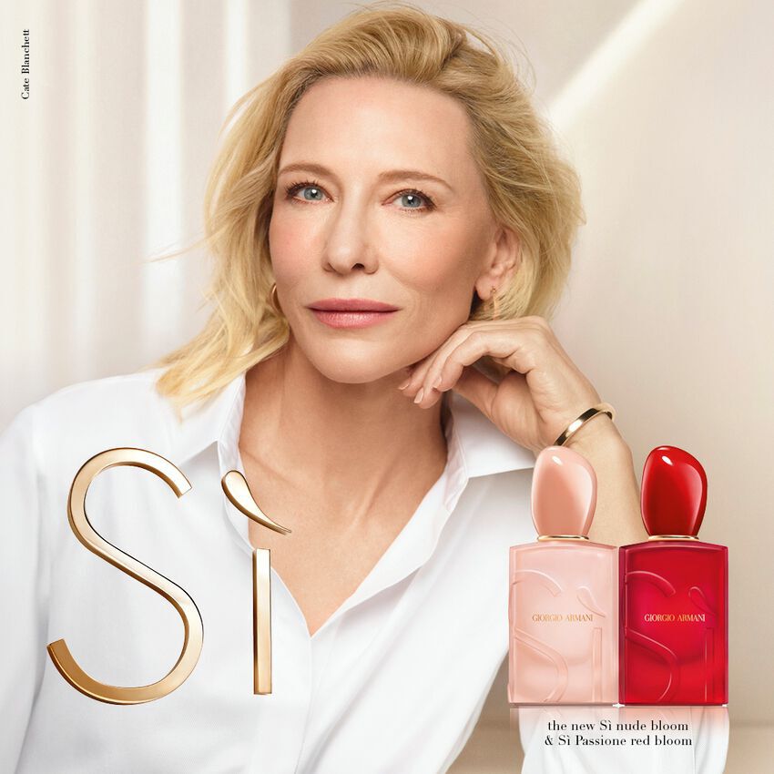 Portrait of Cate Blanchett with Giorgio Armani Si Nude Bloom and Si Passione Red Bloom bottles.