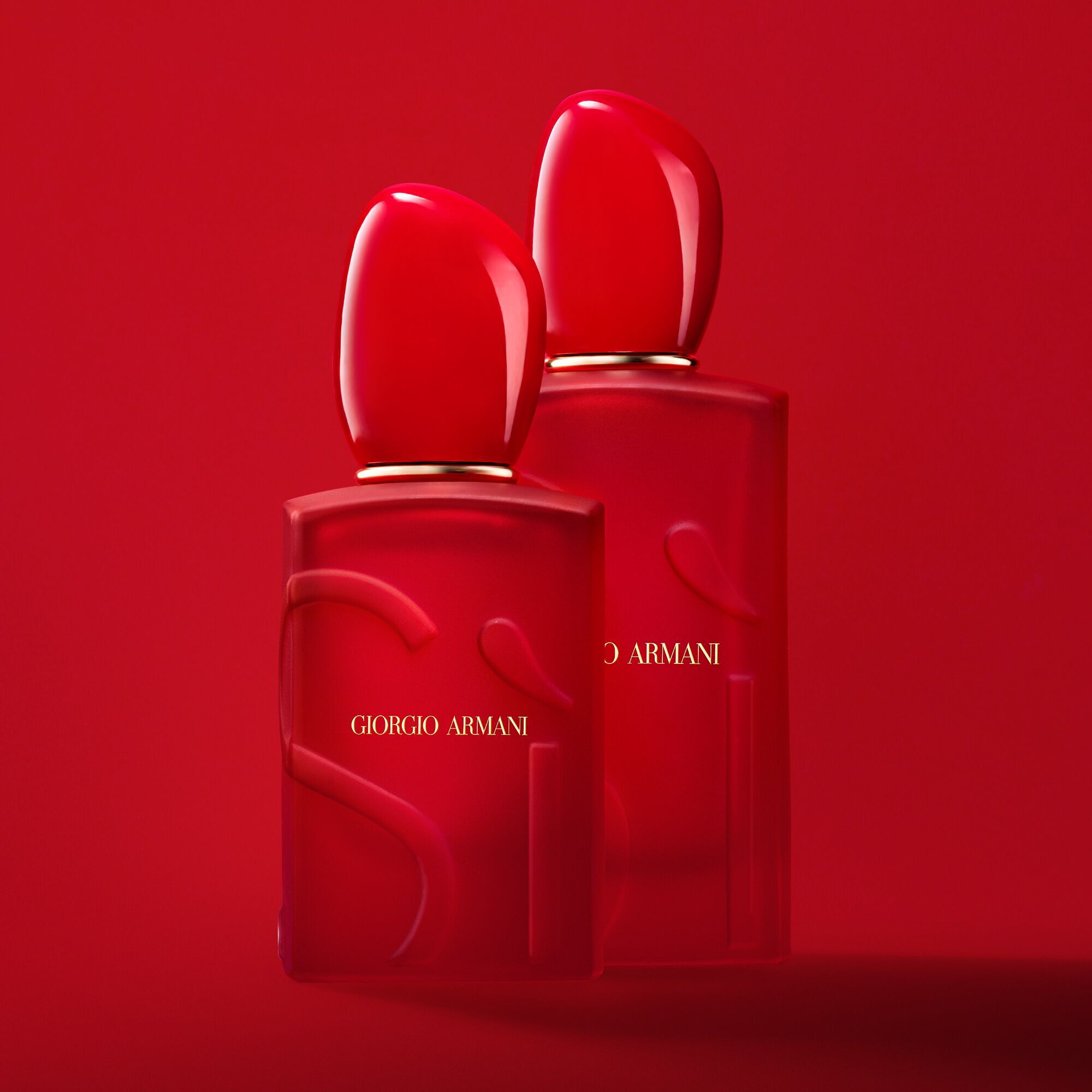 two bottles of Giorgio Armani Si passione Red Bloom in two sizes, 50ml and 100ml.
